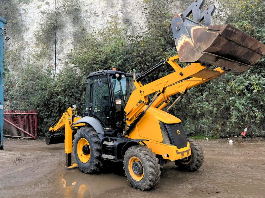 buy a komatsu or a jcb -