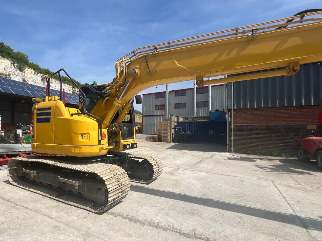 inspecting used komatsu machinery